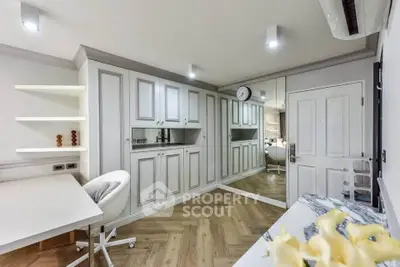 Modern study room with built-in cabinets and stylish decor