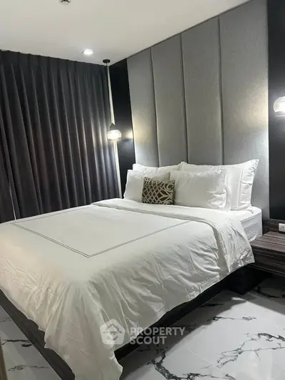 Modern bedroom with elegant decor and cozy ambiance