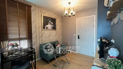Stylish modern living room with elegant decor and cozy seating area.