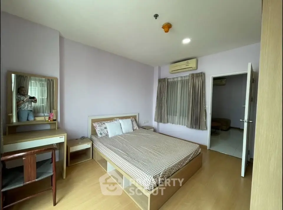 Cozy bedroom with modern furniture and natural light