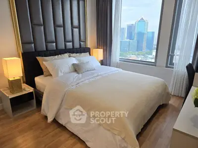 Luxurious bedroom with stunning city view and elegant decor