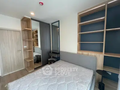 Modern bedroom with built-in shelves and stylish decor