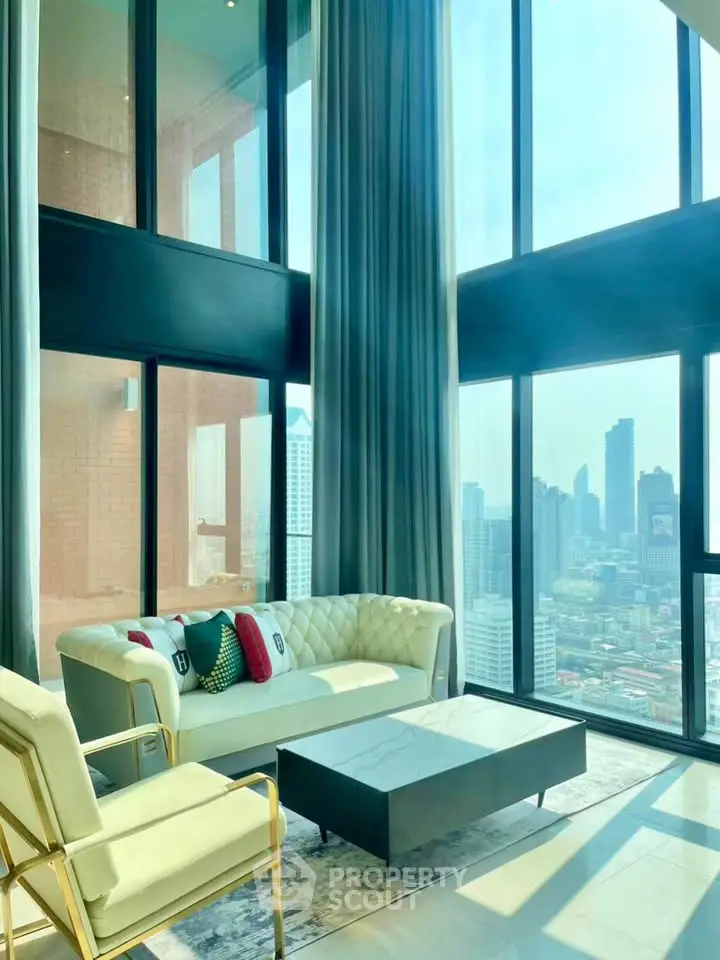 Luxurious high-rise living room with stunning city skyline view and elegant furnishings.