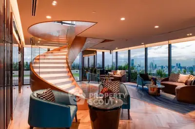 Luxurious living room with stunning city view and elegant spiral staircase