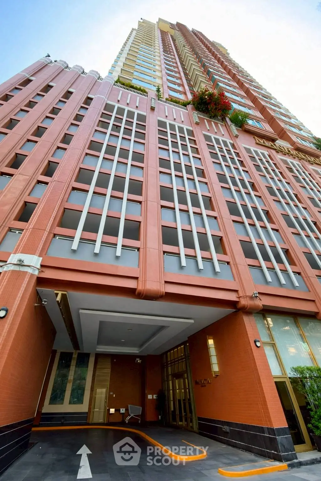 Stunning high-rise building with modern architectural design and vibrant facade.