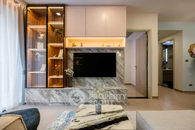 Modern living room with marble accents and stylish shelving