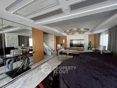 Luxurious living room with elegant decor and grand piano, perfect for entertainment.