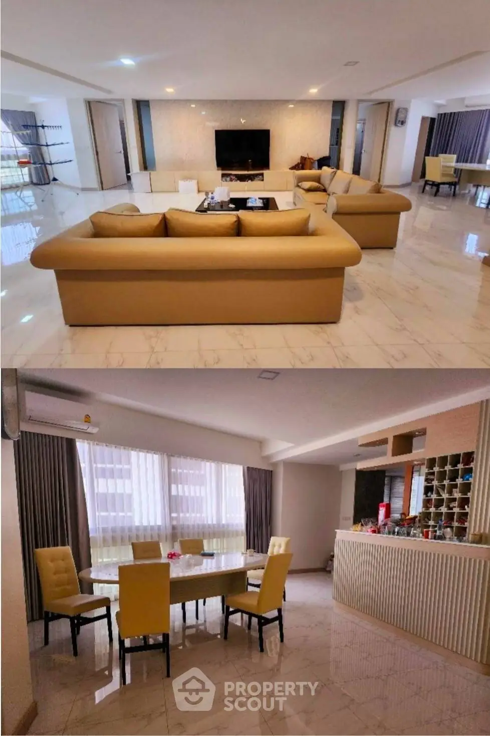 Spacious living and dining area with elegant furnishings and natural light.