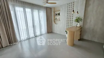 Spacious modern living room with elegant decor and natural light