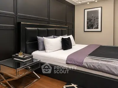 Luxurious modern bedroom with elegant black paneling and stylish decor