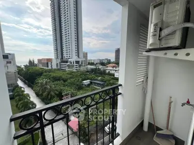 Charming balcony with city view in modern high-rise building