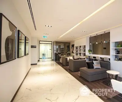 Luxurious modern lobby with elegant seating and marble flooring