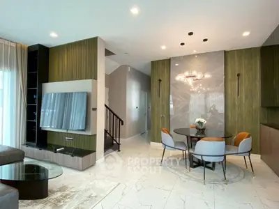 Luxurious modern living room with elegant dining area and stylish decor