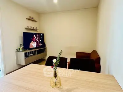 Cozy living room with modern TV setup and stylish decor