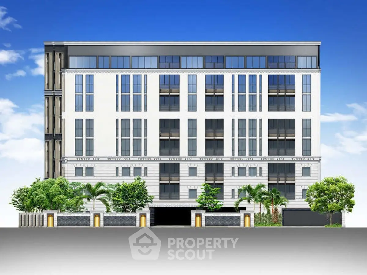 Modern luxury apartment building with sleek design and lush landscaping.