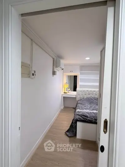 Cozy bedroom with modern decor and built-in storage solutions