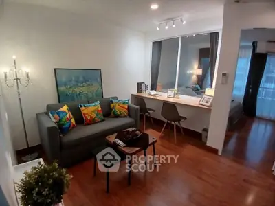 Chic modern living room with colorful accents and cozy ambiance