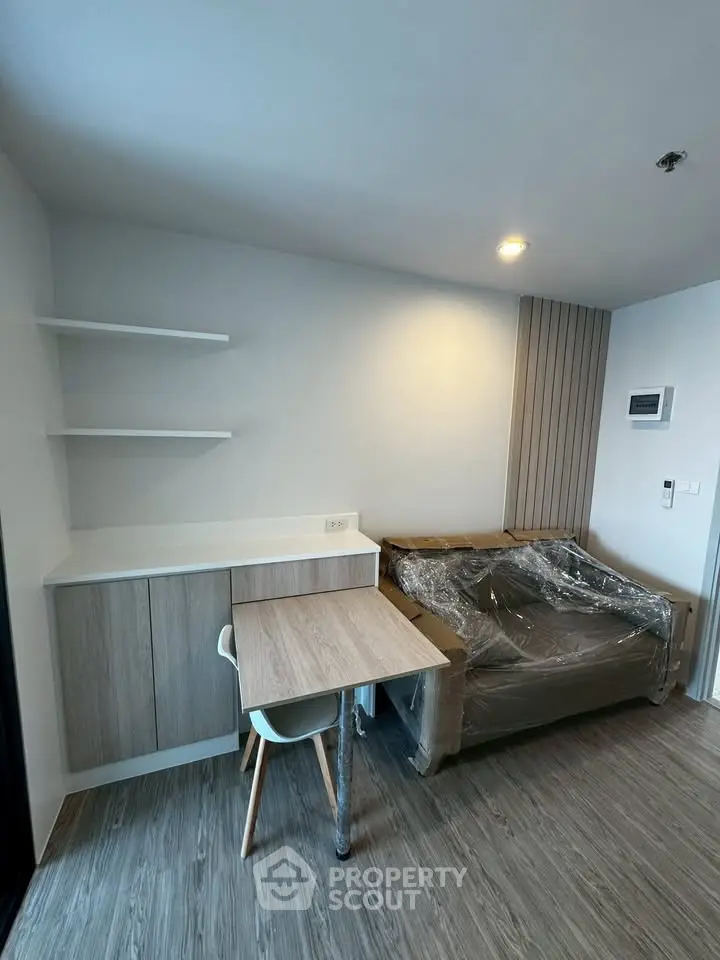 Modern living room with sleek furniture and minimalist design, perfect for urban living.