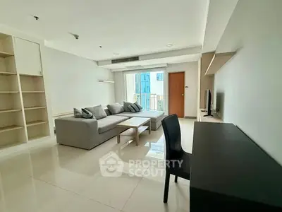 Spacious modern living room with sleek furniture and natural light