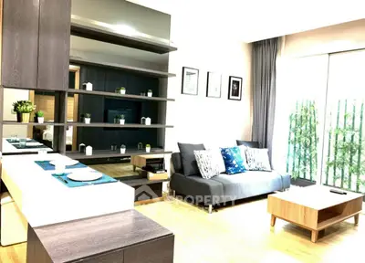 Modern living room with stylish decor and ample natural light