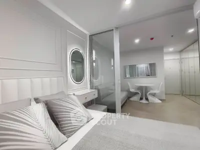 Modern minimalist bedroom with stylish decor and dining area