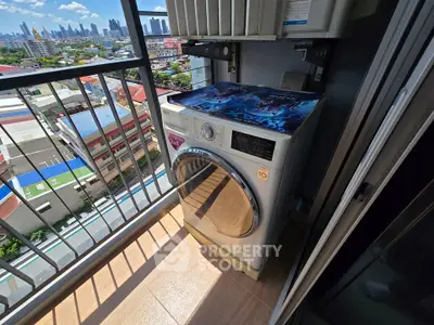 High-rise balcony with washing machine and stunning city view