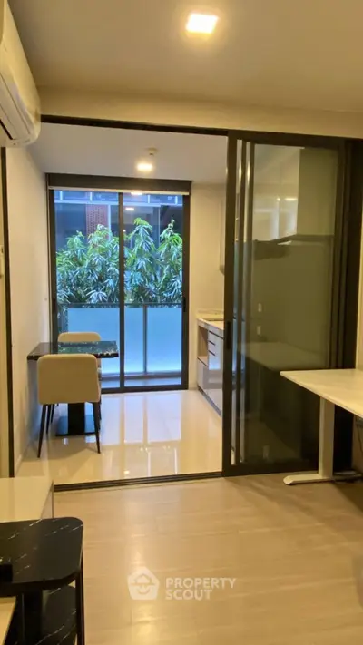 Modern apartment with open layout and balcony view