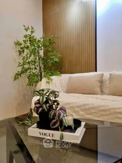 Stylish living room with cozy white sofa and elegant decor