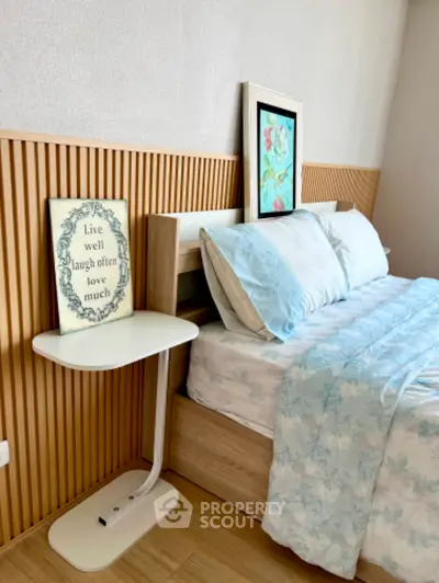 Cozy bedroom with stylish decor and modern wooden paneling