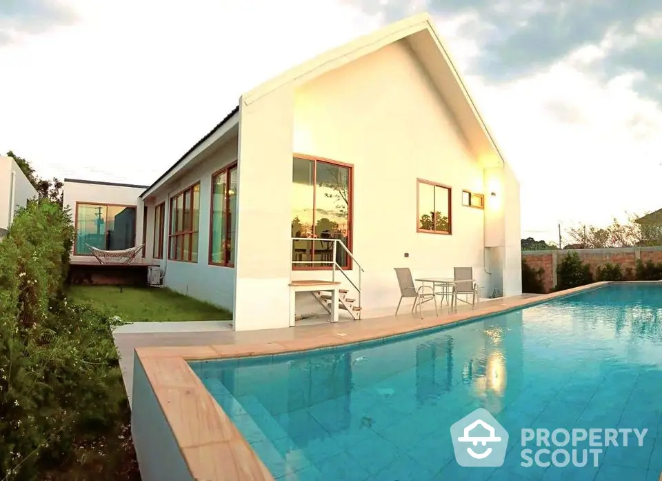 Stunning modern villa with private pool and lush garden, perfect for luxury living.