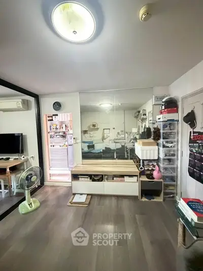 Modern living room with stylish decor and ample storage space