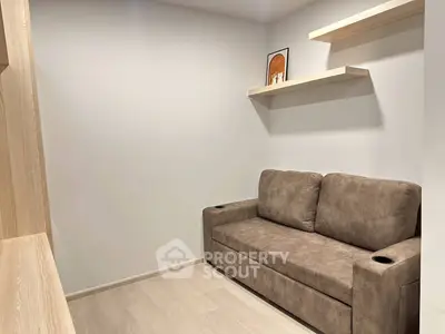 Cozy modern living room with plush sofa and minimalist decor