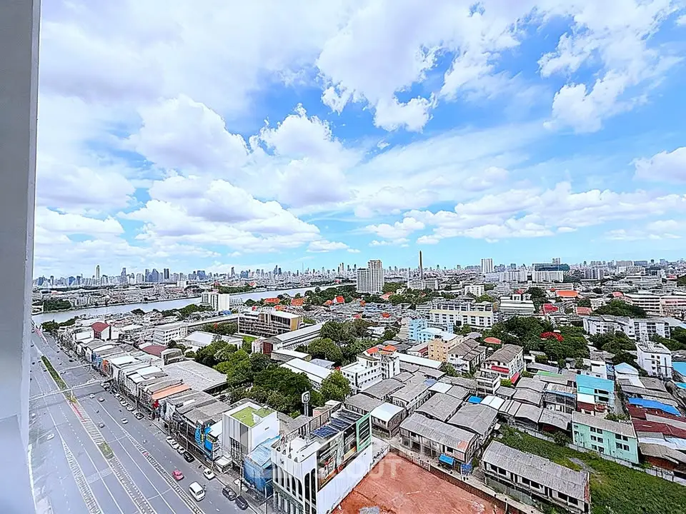 Stunning cityscape view from high-rise building showcasing urban skyline and vibrant neighborhood.