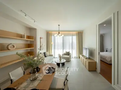 Modern living room with elegant dining area and natural light