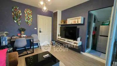 Modern living room with stylish decor and open kitchen layout