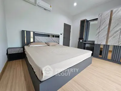 Modern bedroom with sleek furniture and minimalist design