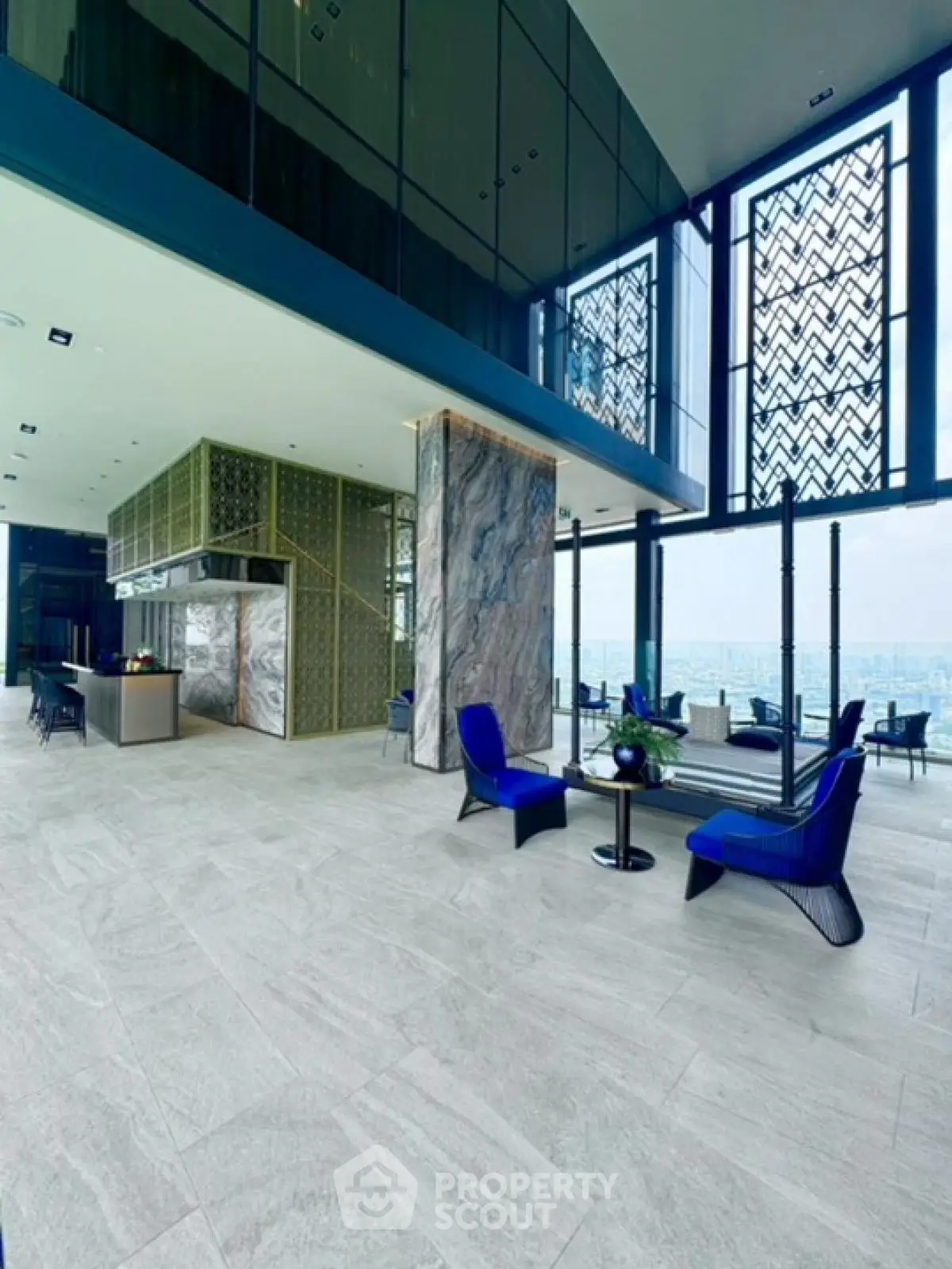 Luxurious modern living room with high ceilings and panoramic city views