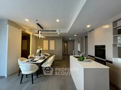 Luxurious modern kitchen with open layout and elegant dining area
