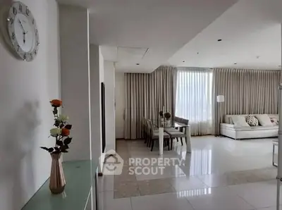 Spacious modern living room with dining area and elegant decor