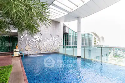 Luxurious rooftop pool with stunning city views and modern architectural design.