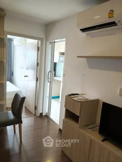 Modern apartment interior with air conditioning and stylish furniture