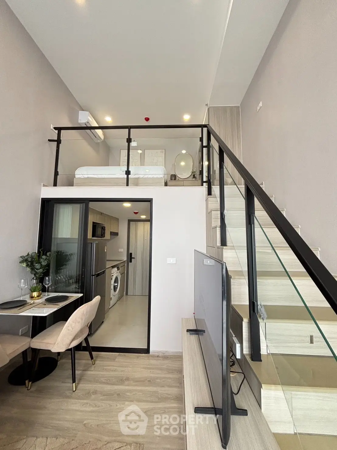 Modern loft apartment with mezzanine bedroom and stylish interior design