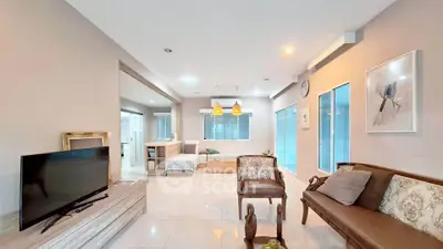 Spacious living room with elegant furniture and open layout in modern home
