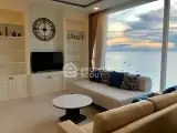 Luxurious living room with stunning ocean view and elegant decor