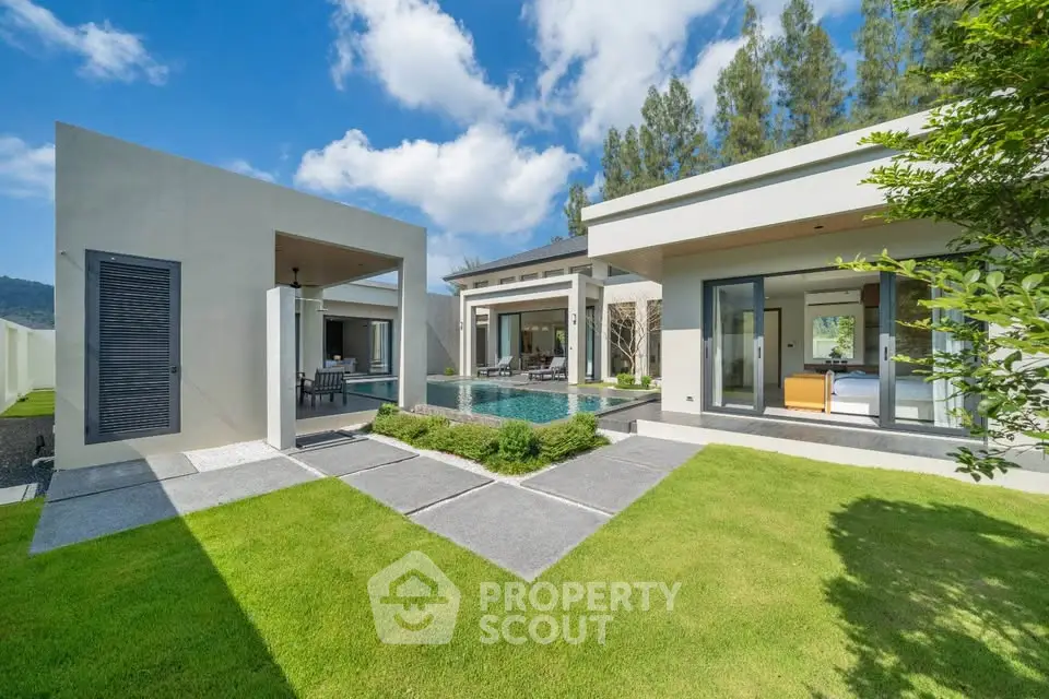 Luxurious modern villa with private pool and lush garden, perfect for serene living.
