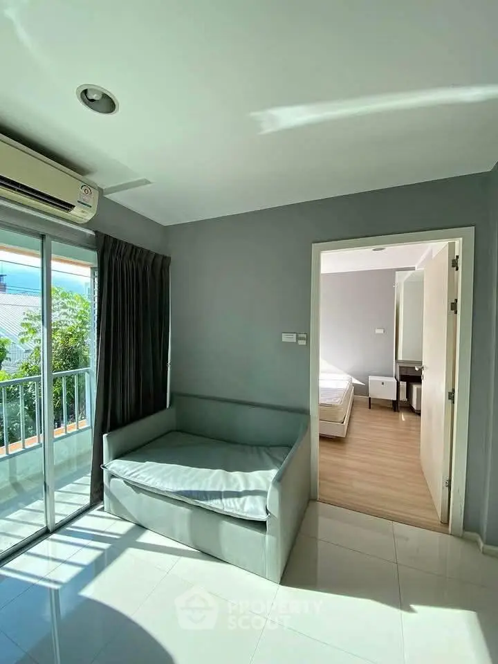 Bright and airy apartment with balcony and modern furnishings, perfect for comfortable living.