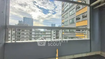 Urban balcony with city view and modern architecture