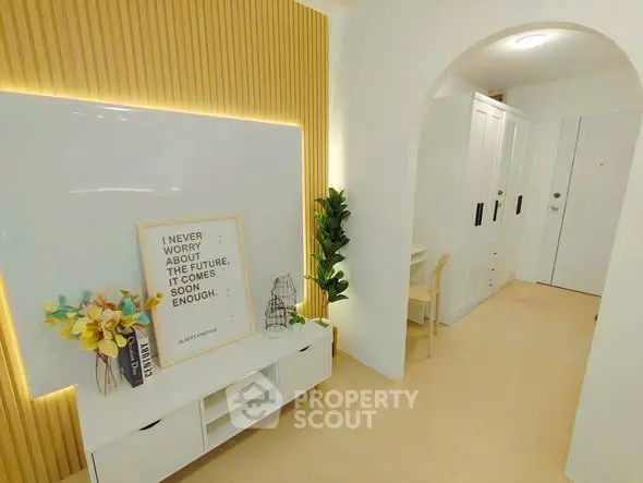 Stylish modern hallway with sleek storage and decorative accents