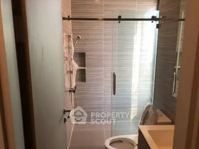 Modern bathroom with sleek shower and contemporary fixtures