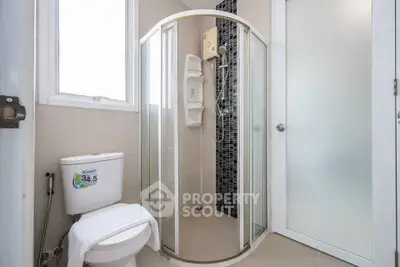 Modern bathroom with glass shower and sleek design